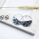 Boucles d'oreilles Les Georgettes motif girafe finition argent diamètre 43 mm